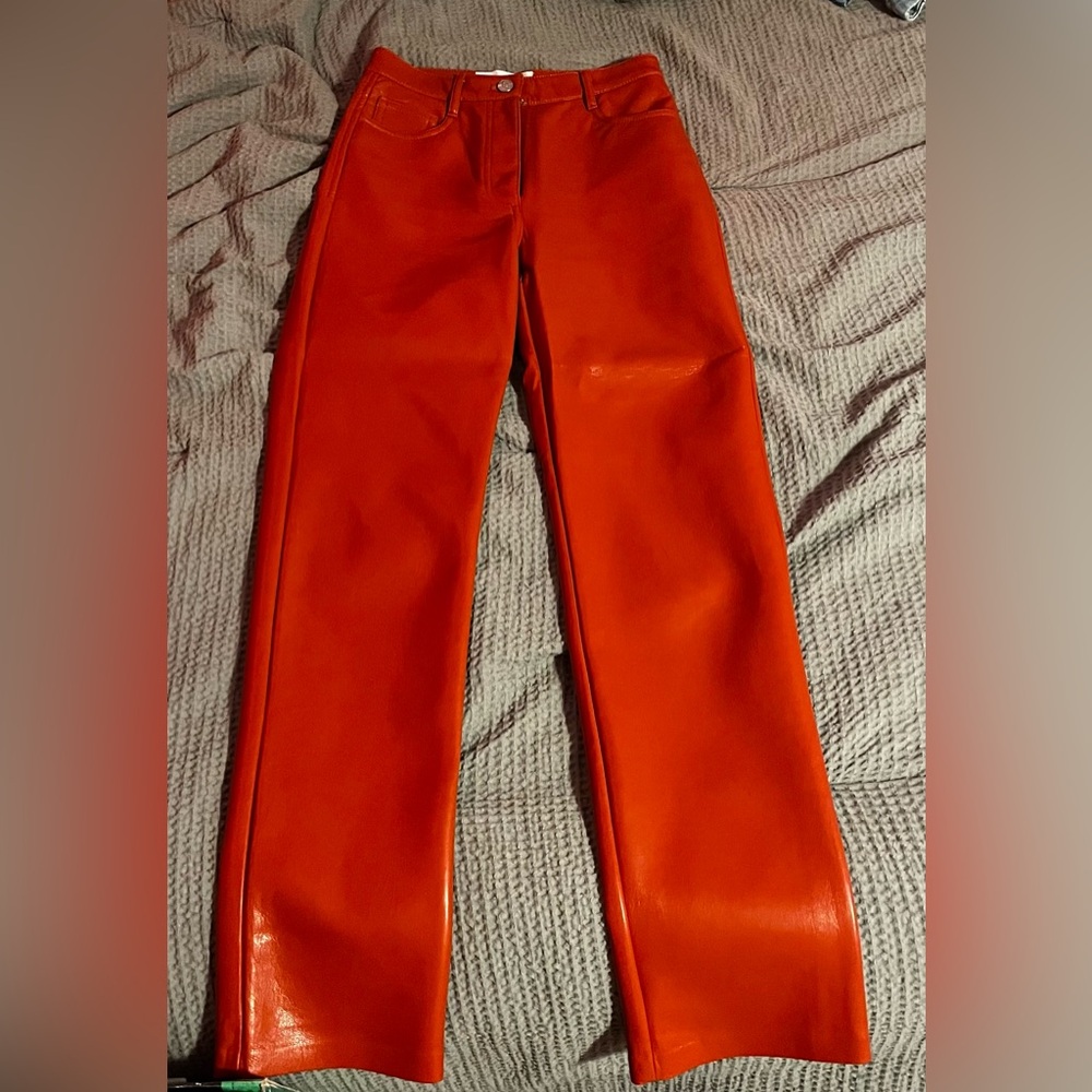 The Melina Pant by Wilfred (Aritzia) in burt orange. Size 0